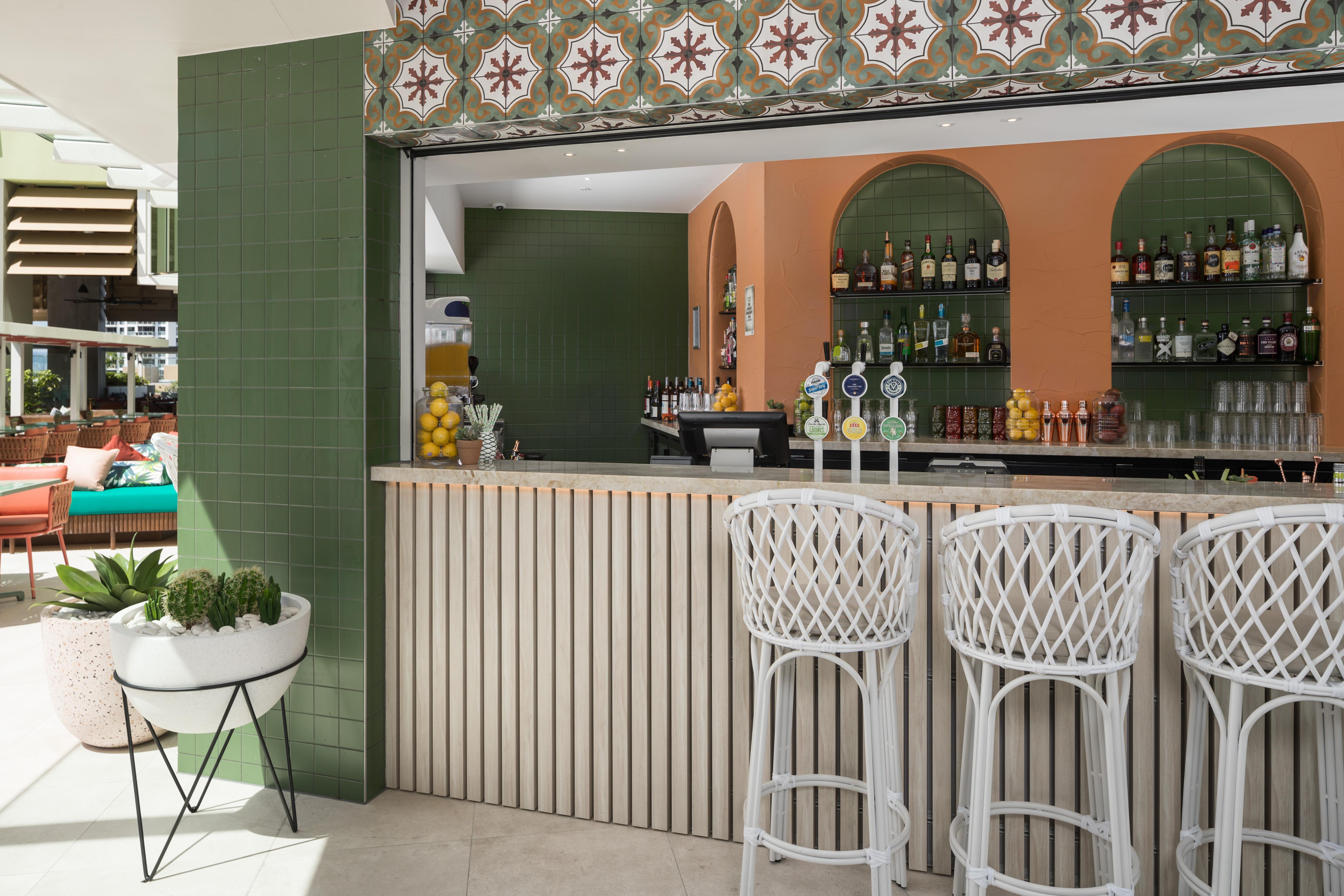 Crystalbrook Bailey Hotel Cairns Bagian luar foto The bar at the hotel