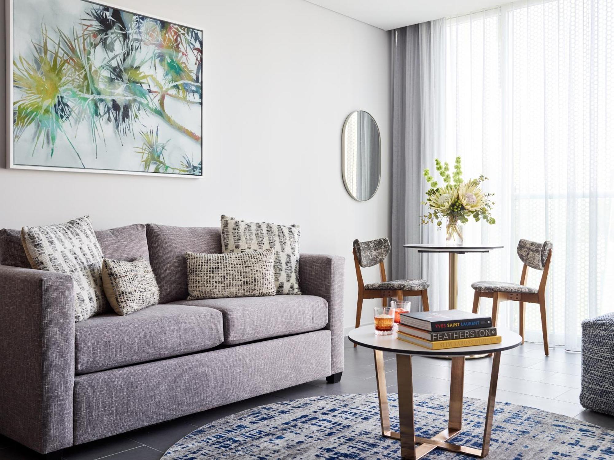 Crystalbrook Bailey Hotel Cairns Bagian luar foto A living room in a serviced apartment in Singapore